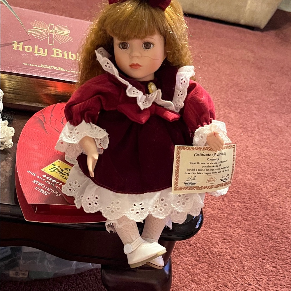 Musical moving Expressions Porcelain Doll in Red and White Attire